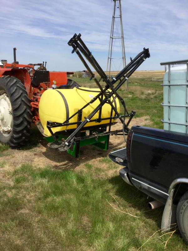 May 2015 Wayne Schottler getting ready to spray on his farm near Froid MT